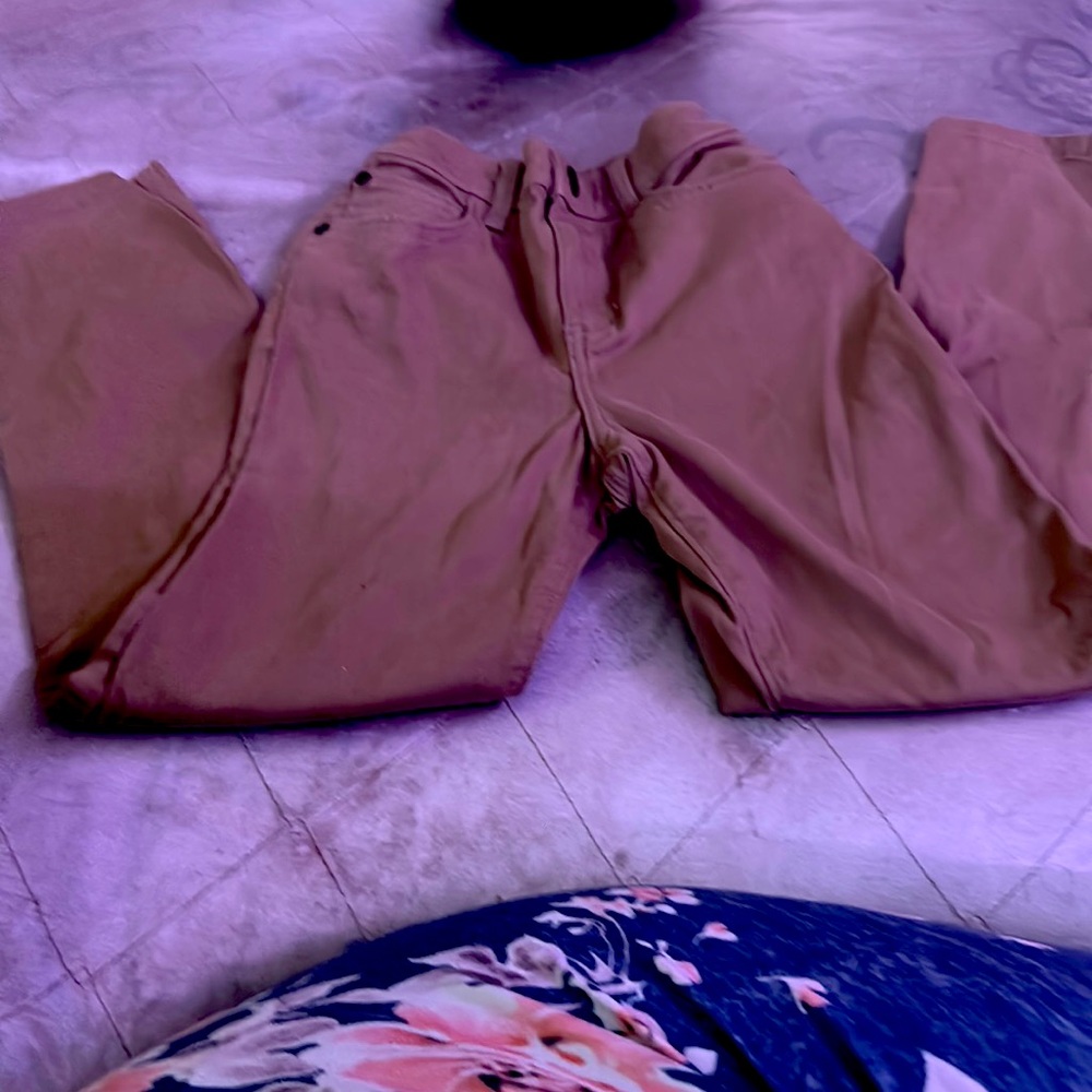 A pair of tan pants by jumping beans